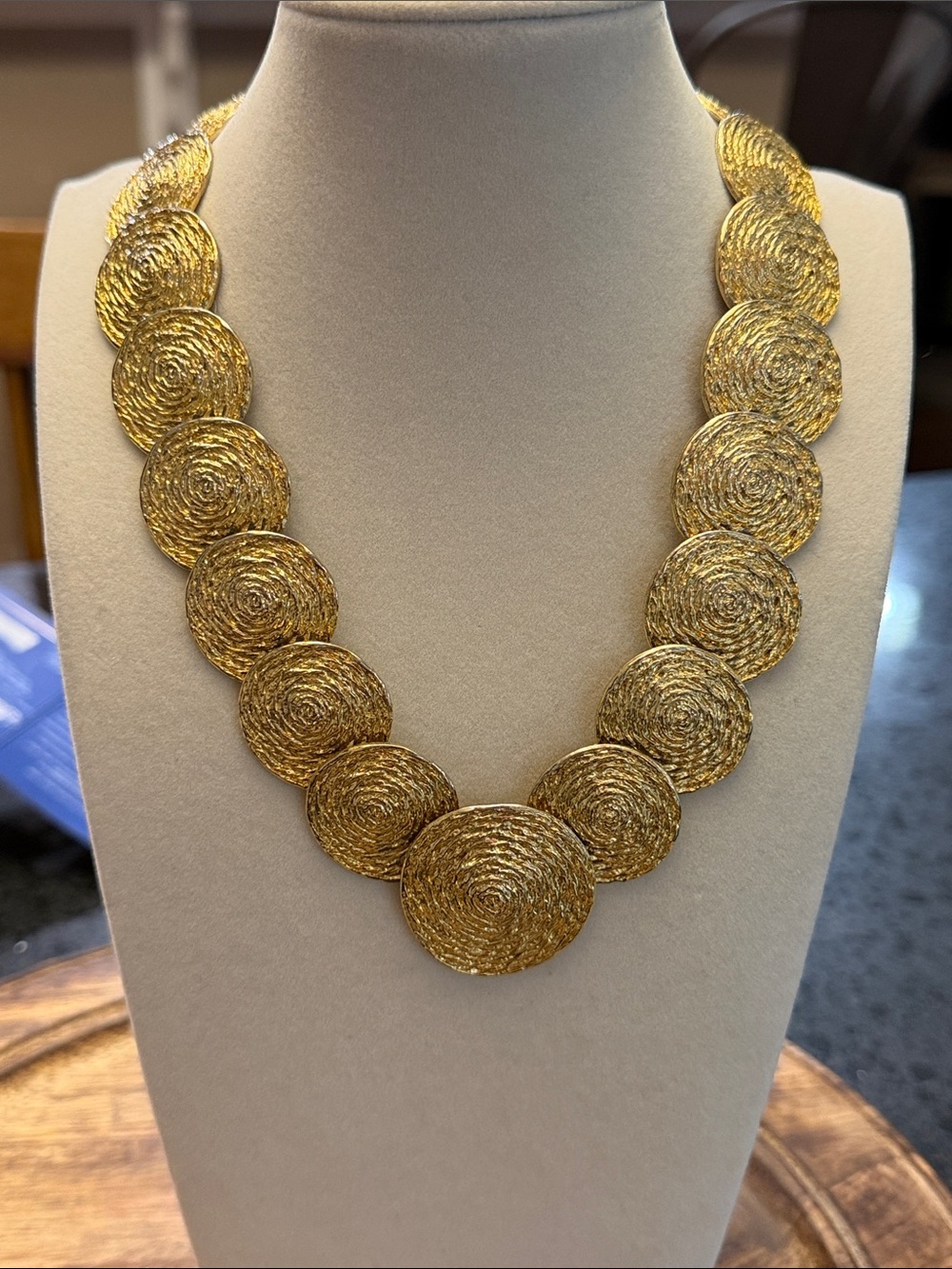 Vintage Carol Dauplaise gold-tone spiral disc statement collar necklace.